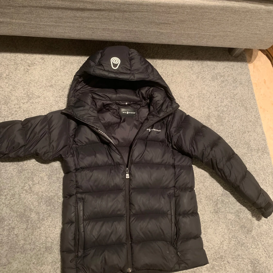 Svart dunjacka från Sail racing