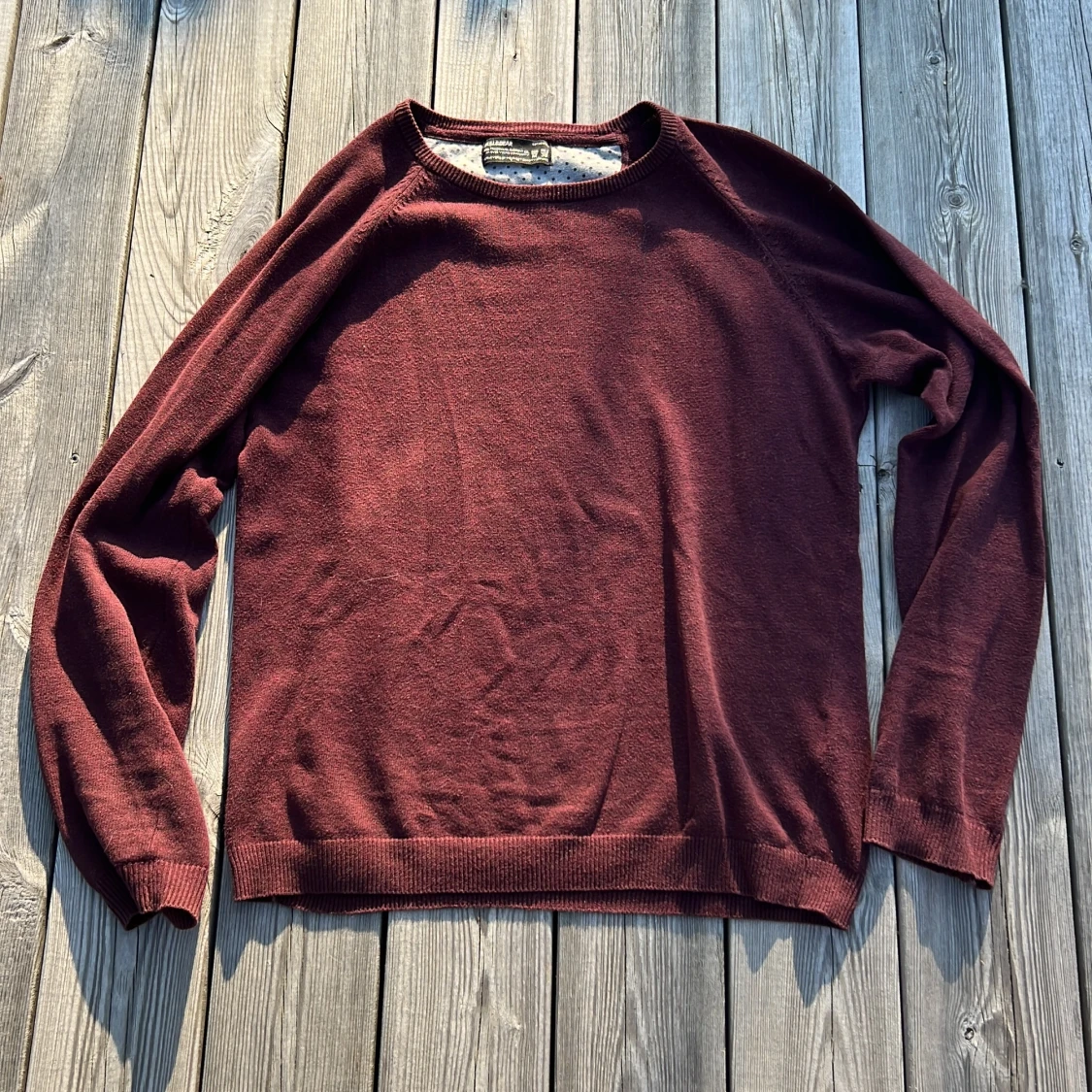 Vinröd stickad tröja