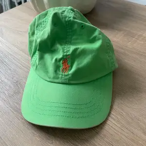 Grön keps med orange häst från Polo Ralph lauren, super skick