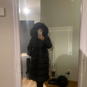 Vinterjacka - Lång vinterjacka i strl L