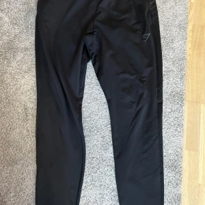 Gymshark byxor - Träningsbyxor storlek L.