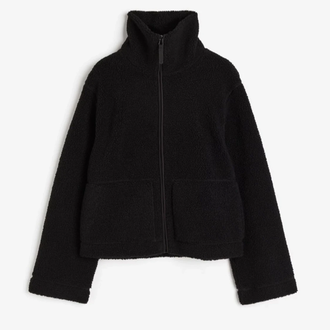 Svart teddyjacka