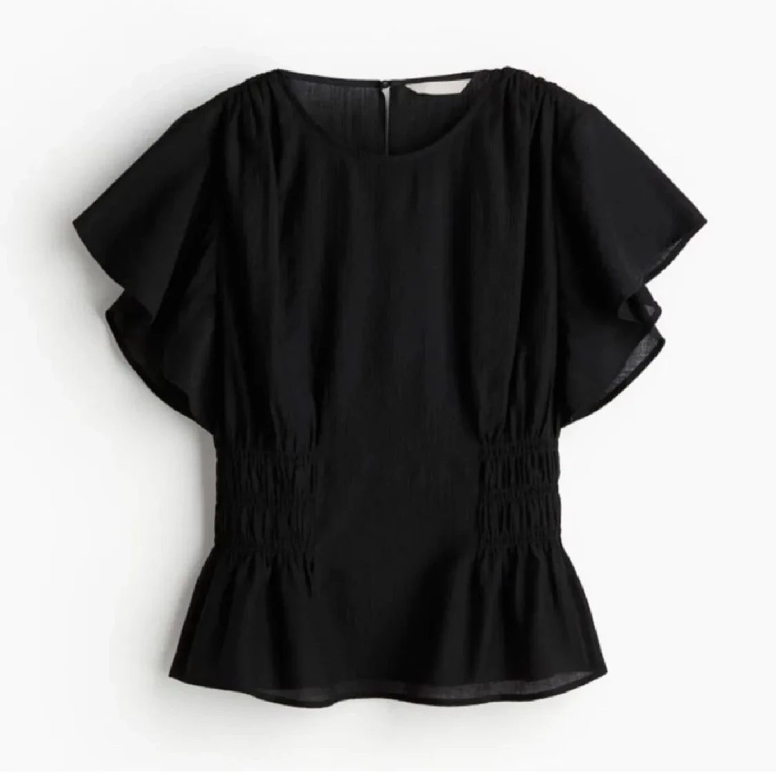 Blus med intagen midja & volanger