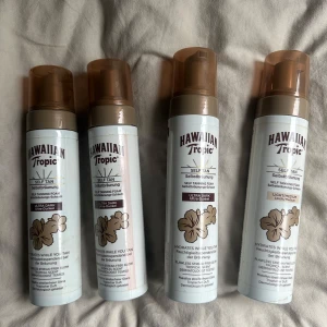 Hawaiian brun utan sol  - Brun utan sol, har gått ut i datum. 3 är fulla en är halvfull. 