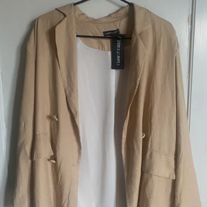 Kavaj - Kavaj med axelvadd, endast testad