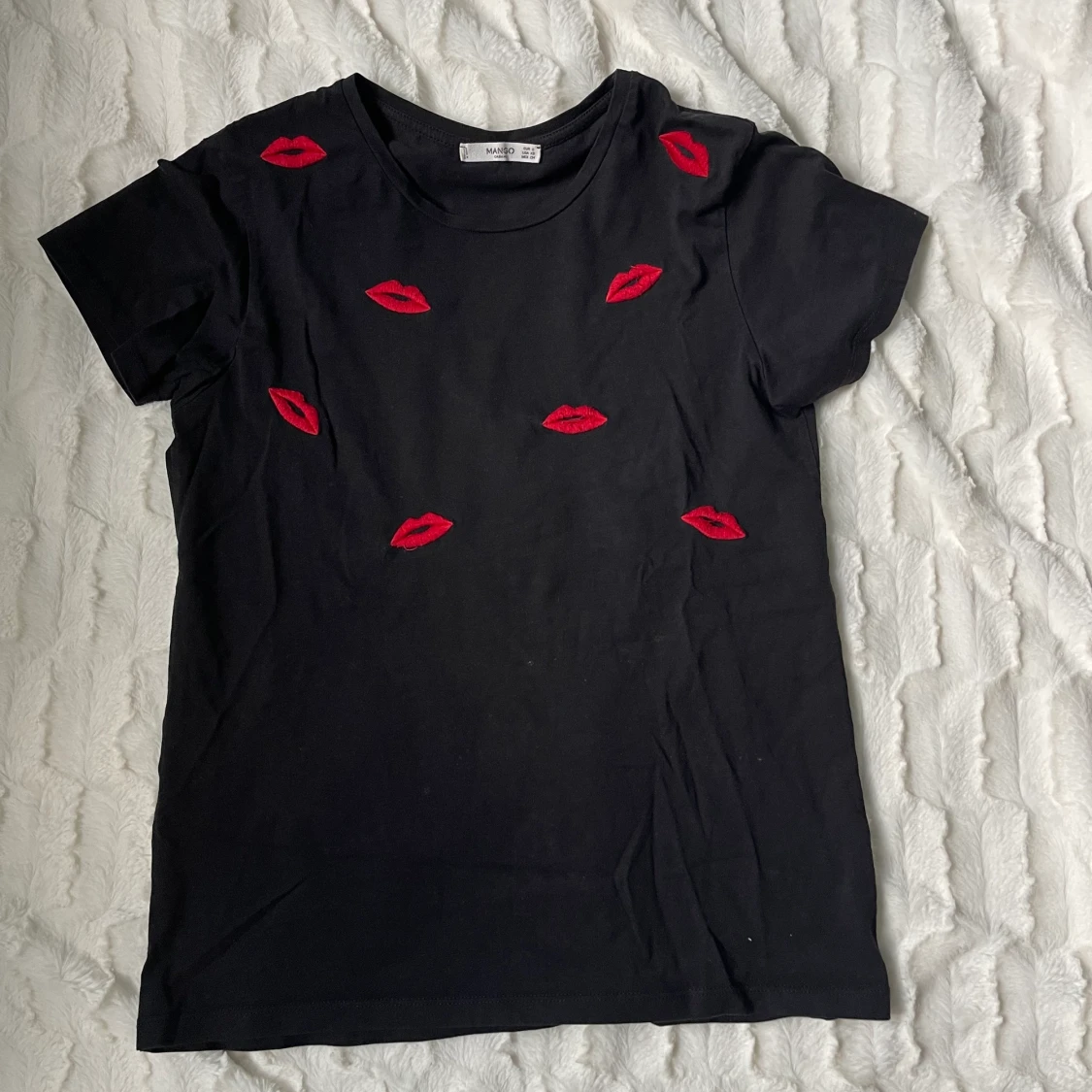 T-shirt med pussmunnar