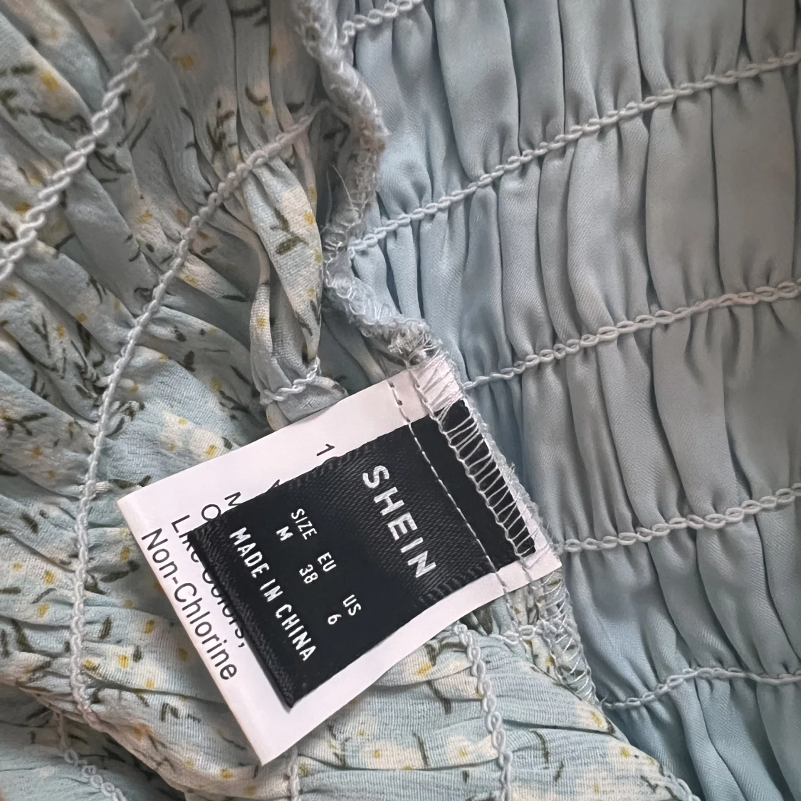 Blåblommig topp - 91