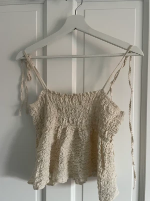 Topp - Fin sommar topp som man knyter vid axlarna