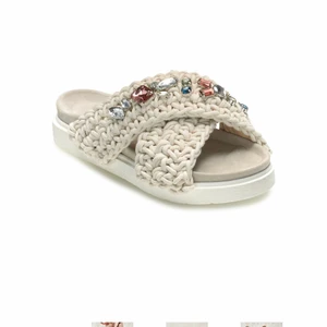 Inuikii tofflor  - Använda fåtal gånger 