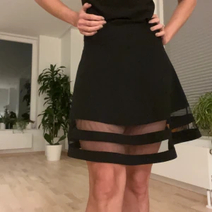 Adorable skirt with tulle - Very unique design! Black skirt with tulle see through. Note! Size says medium but it is very small so it is more like a small or XS. Arranging closet and this not longer fits. 