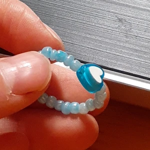 Gullig ring av pärlor - En jätte gullig ring med pastell blåa pärlor💕💕 skriv om ni är intresserad och kom gjärna med prisförslag :) frakten kostar 13 kr ;)