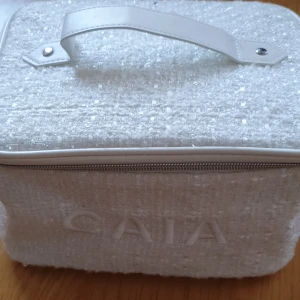 Caia necessär - En necessär från caia som är oanvänd