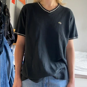 T-shirt Lacoste - Svart vintage T-shirt från Lacoste