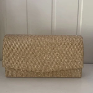 Clutch - Glittrig clutch/aftonväska 