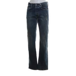 lågmidjade jeans med rak passform