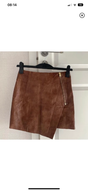 Fejk läderkjol - Fejk läderkjol storlek XS