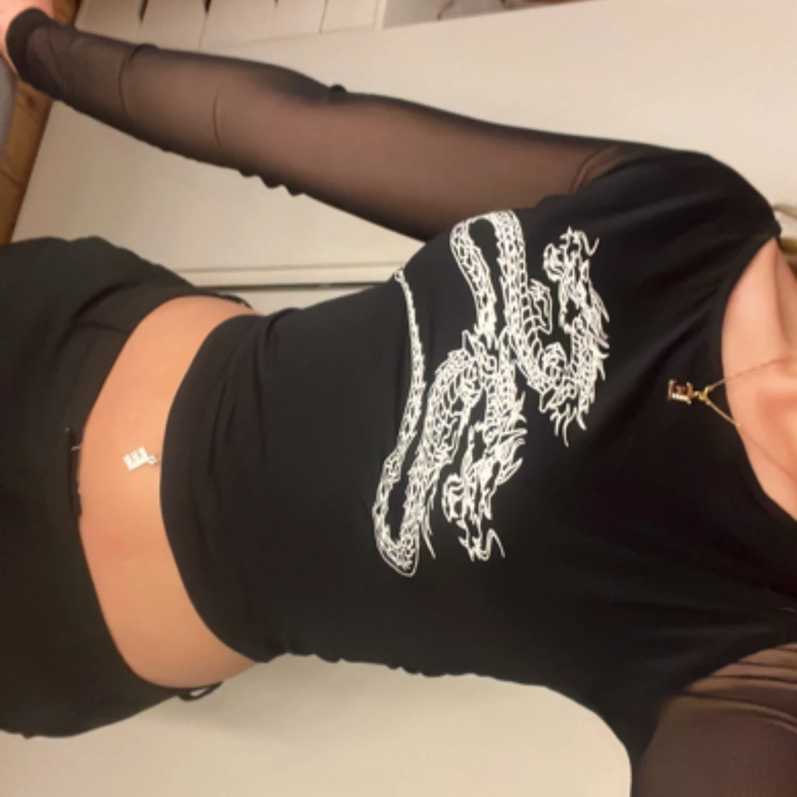 Topp med mesh armar - 90