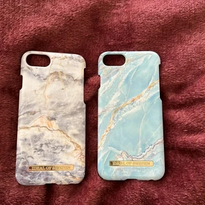Ideal of Sweden mobilskal - iPhone 8 passform, den med marmor är lite sönder, men det syns knappast. Säljer de för har bytt mobil och något kanske vill köpa de. Bra skick för använde nästan aldrig de. De är äkta eller vad man säger o h inget annat är sönder. :)) 150 tillsammans, ni kan pruta om ni vill