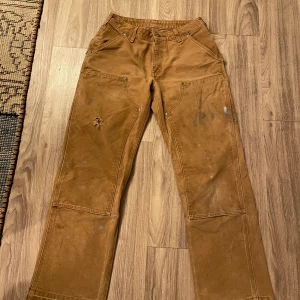 Carharrt double knee - Carharrt double knee Sitter som ett par 29/31 Beige vintage skick