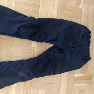 Termobyxor  - Något slita termobyxor från Peak performance i storlek 160