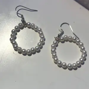 White pearl earrings 🕊✨