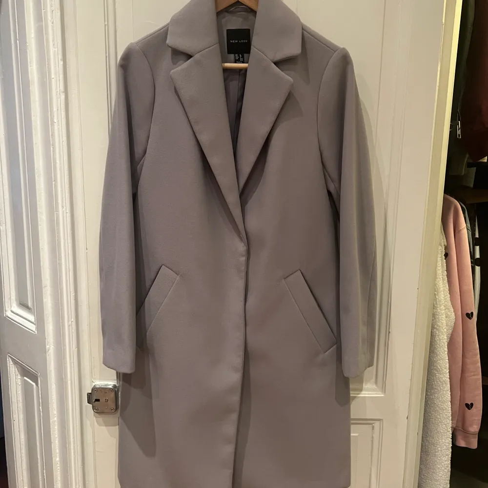 New Look long pea coat in lovely lilac colour. Barely worn, perfect condition. EU size 36. . Jackor.