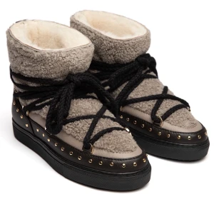 Inuikii curly rock - Inuikii skor i modellen curly rock💓 super fint skick och såå sköna nu i vinter💓 inte kommit till så mycket använing då dom är snäppet för små för mig💓 fler frågor svarar jag gärna på privat💓