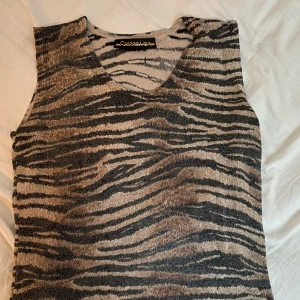 Topp - Topp som inte står ngn storlek i men skulle säga M