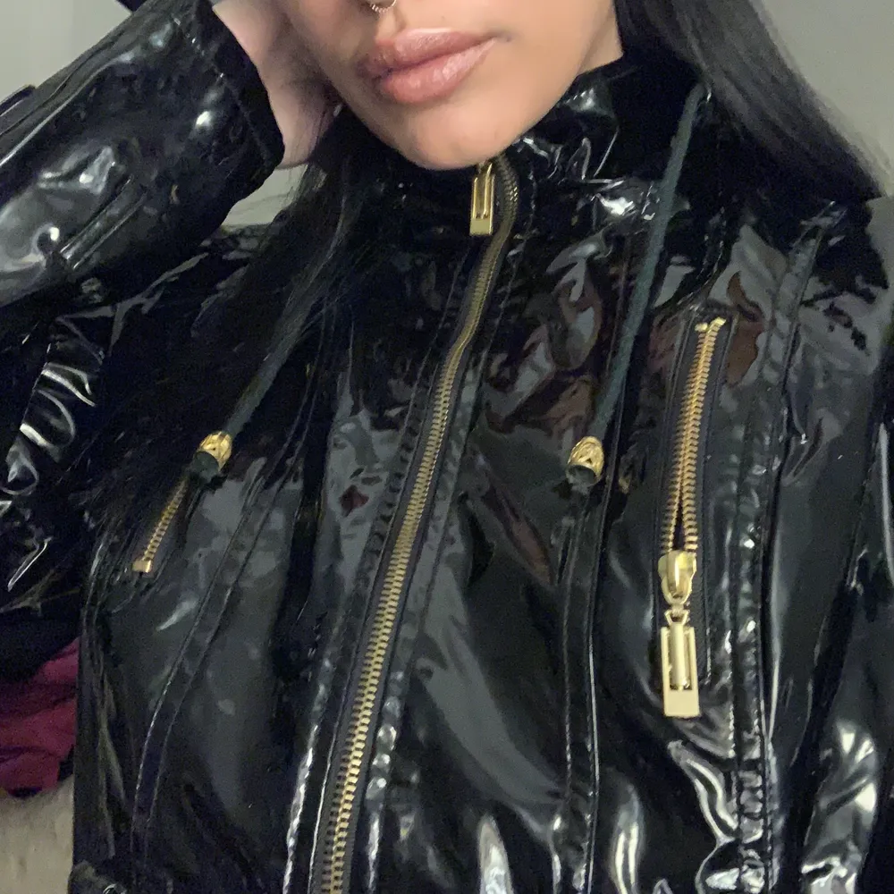 Shiny, sexy, nightclub, bdsm kind of jacket. I love and can’t believe I’m selling it. Perfect conditions and with hoodie . Jackor.