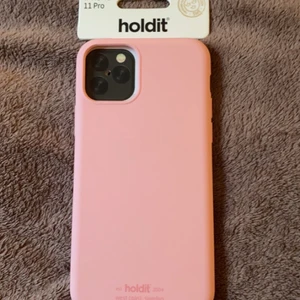Holditskal - Jättesnyggt rosa skal från holdit som passar iPhone 11 PRO. Helt nytt då de inte passar min mobil. 