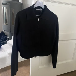 Åhléns cardigan  - Åhléns cardigan med stora fickor 