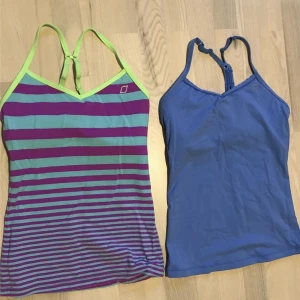 Träningstopp - Träninglinnen från märket Lorna Jane, storlek xs, vilket man inte kan se i linnena för jag har klippt bort den lappen, men det är xs  Inbyggd bhtopp och justerbara band.  I utmärkt skick, bara använda en gång.
