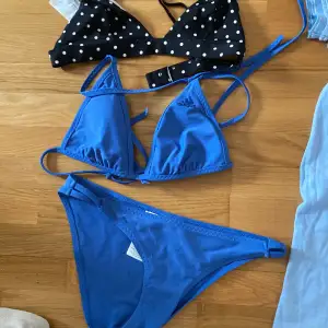 En blå fin adidas bikini med en extra topp till från Hm 