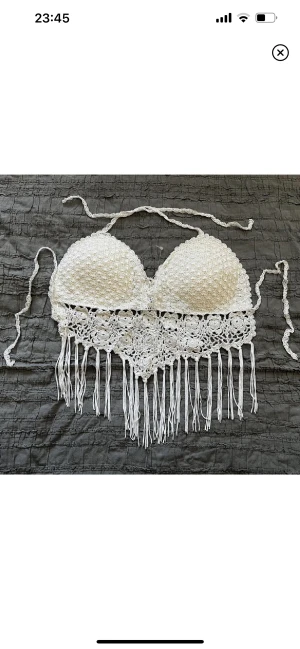 Virkad topp - Virkad stickad topp, aldrig kommit till användning. Storlek: One size 