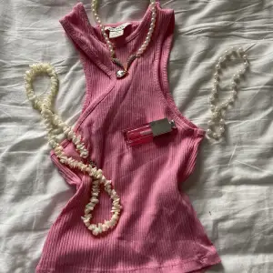 Fint rosa linne köpt från Monki för något år sedan. Knappt använt. Väldigt stretchig så passar mig med S