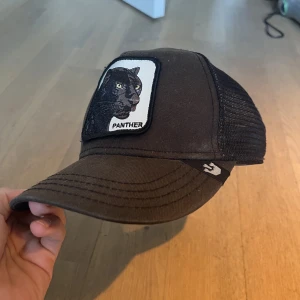 Panther keps - Väldigt använd inte jätte sliten 