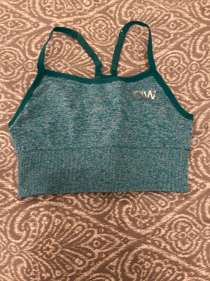 ICIW sporttopp - Säljer denna fin sporttopp från ICIW då den inte passar längre. Knappt använd så i fint skick. Säljer i rosa oxå. Skriv priv om nåt undras. Priset kan diskuteras🫶🏼 Använd gärna köp nu💕