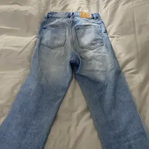 Högmidjade jeans, långa