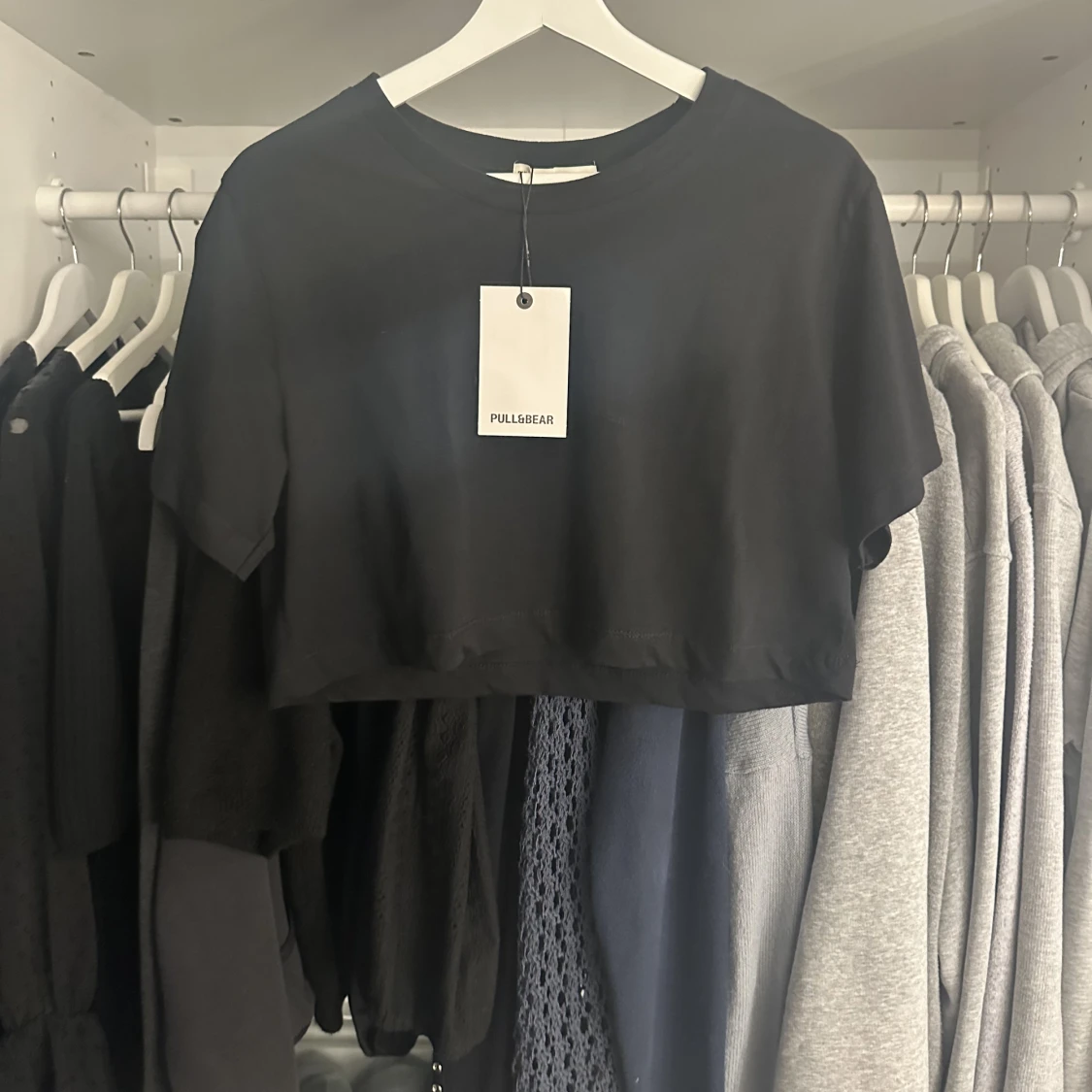 Svart kort topp  - 91