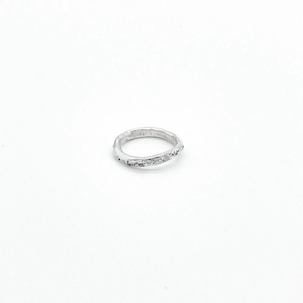 Each ring showcases a unique stone texture and form crafted from handpicked stones found in the Swedish woodlands.  Made to order, all sizes  Made of Sterling silver 925  Handmade in Stockholm, Sweden. Accessoarer.