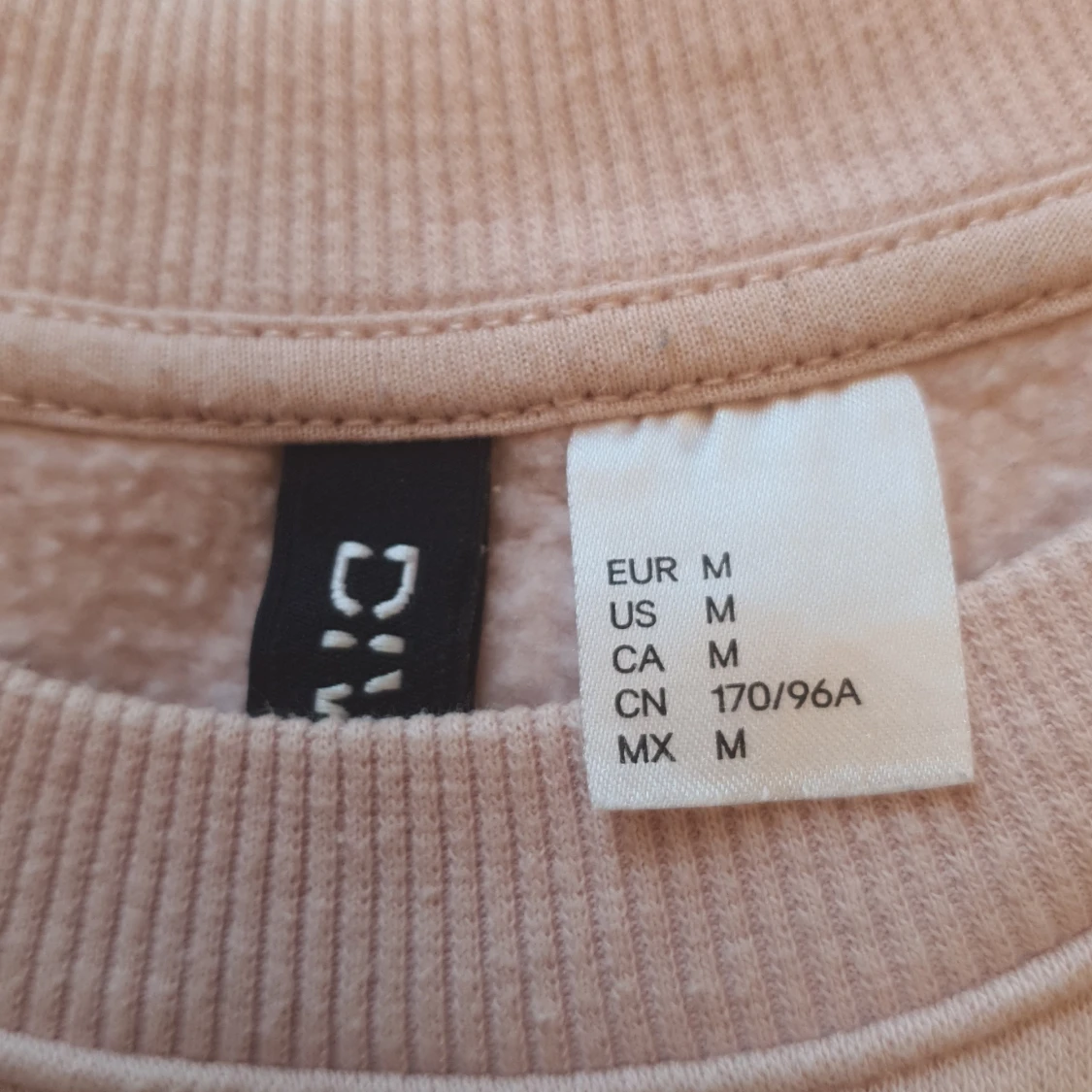 Ljusrosa collegetröja Divided stl M - 90