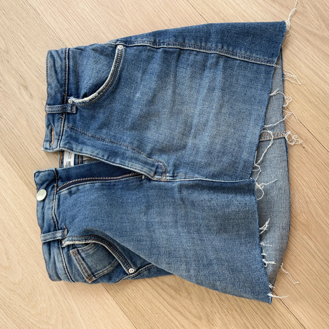 Lågmidjad jeanskjol - 90