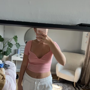 Topp - Rosa fin topp 43kr för frakten 