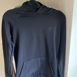Peak performance hoodie - Peak performance hoodie i storlek S