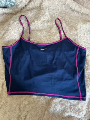 Träningstopp - Kort tränings linne Använt en gång