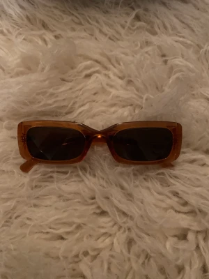 Solglasögon  - Sparsamt använda 