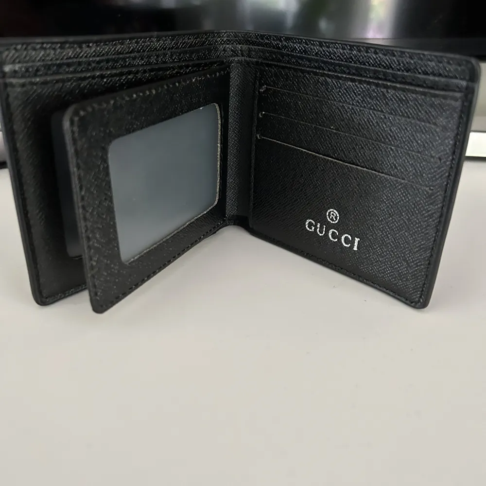 Helt ny Gucci plånbok  Aldrig använd . Övrigt.