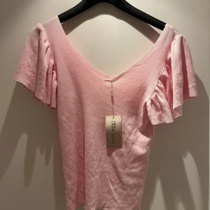 Rosa tröja  - Aldrig använd 