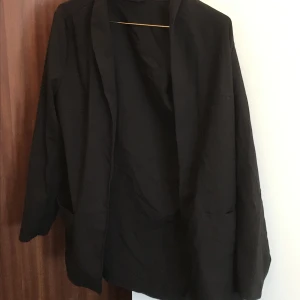 Kavaj - Svart kavaj, bra skick.