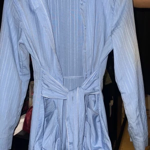 Skjort/klänning - Den är använt en gång